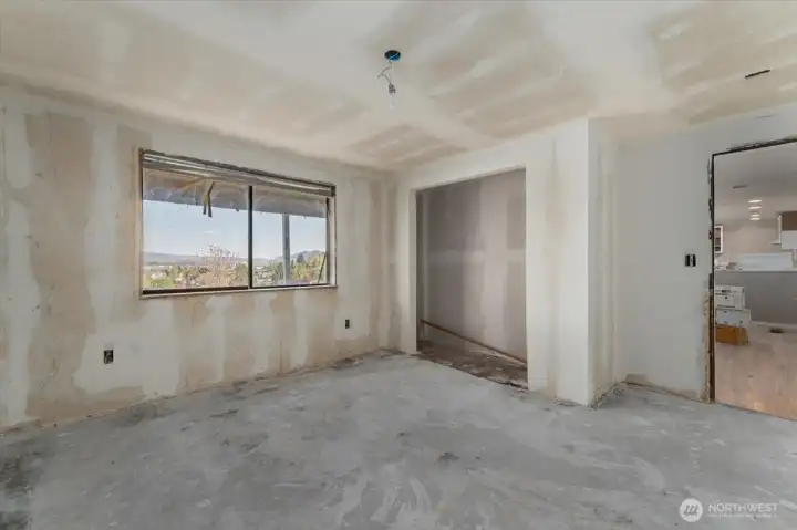 Second downstairs partially finished bedroom.