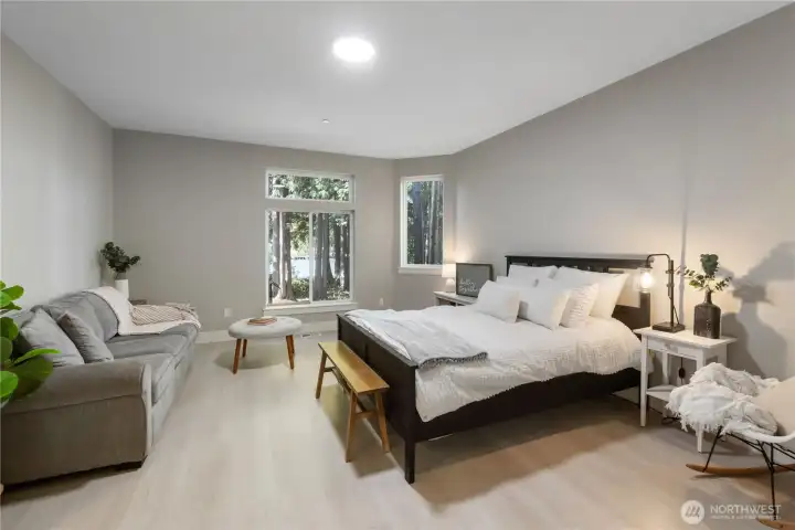 The spacious primary designed to be a private retreat