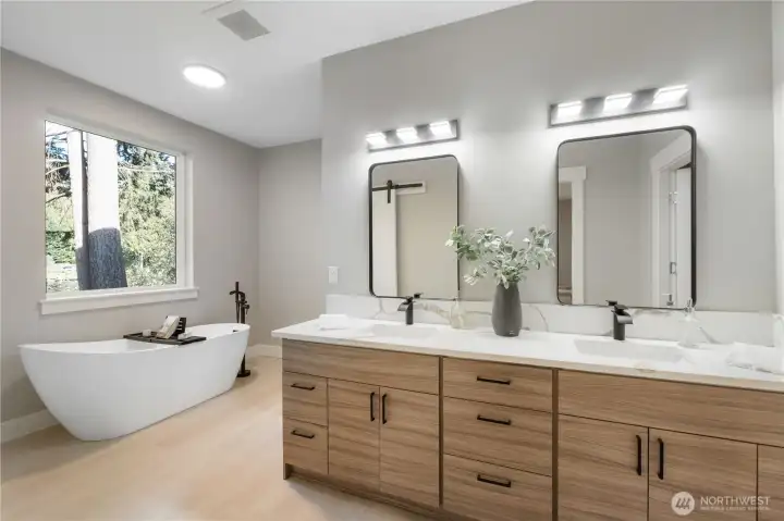Stunning primary 5-piece bathroom w/ double vanity.