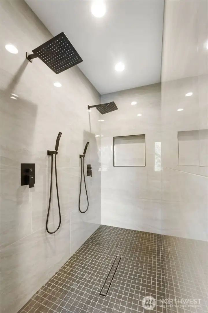 Relax in the huge double-headed shower