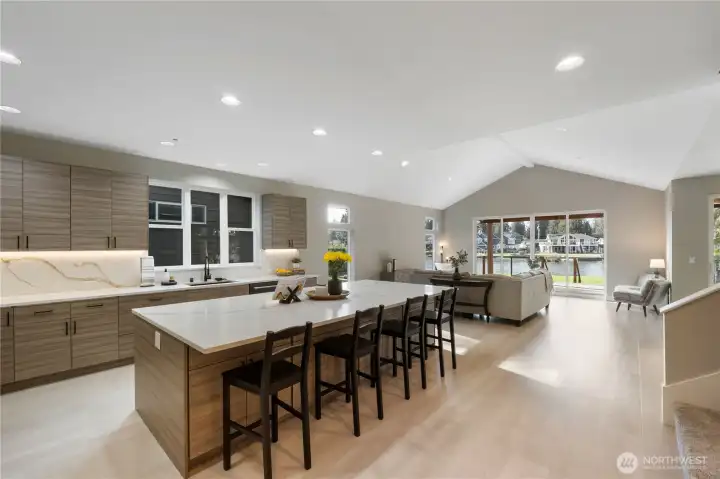 Designer kitchen enhanced w/ open concept to lake views