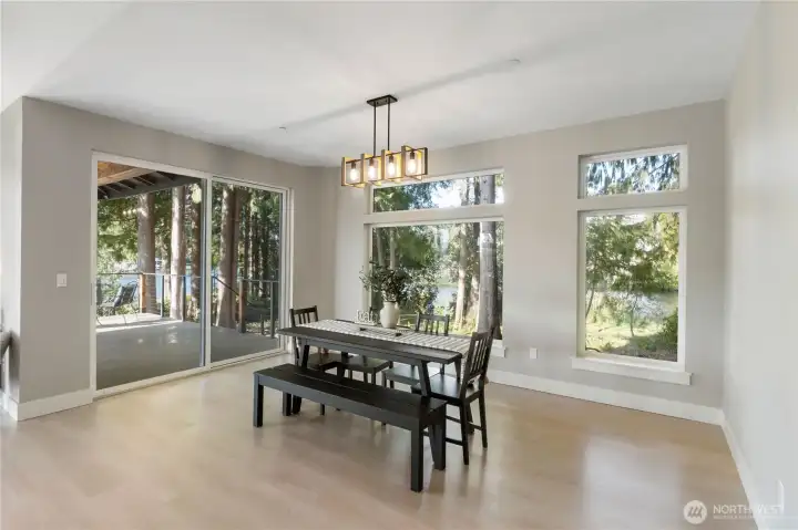 Abundant natural light and lake views from dining area