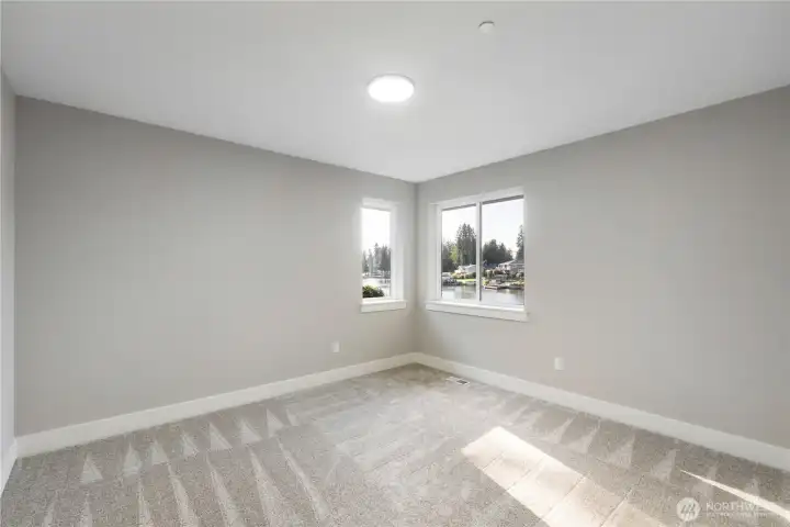 2nd bedroom overlooking lake w walk-in closet