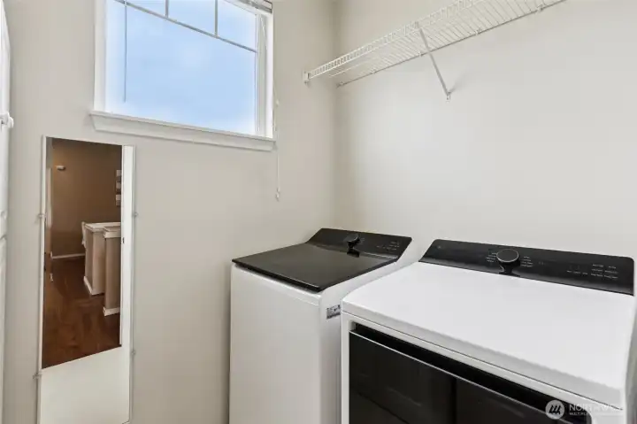 Convenient upstairs laundry room located near bedrooms