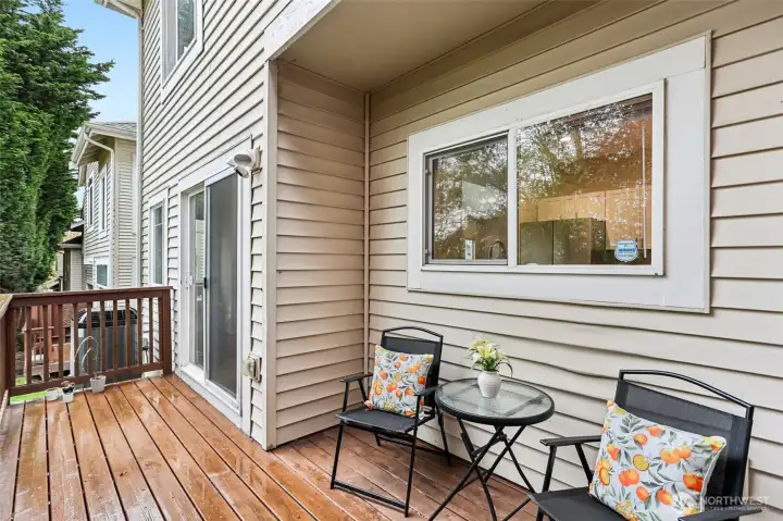 Private deck space perfect for morning coffee or evening unwinding, with easy access from the main living area for indoor-outdoor living.