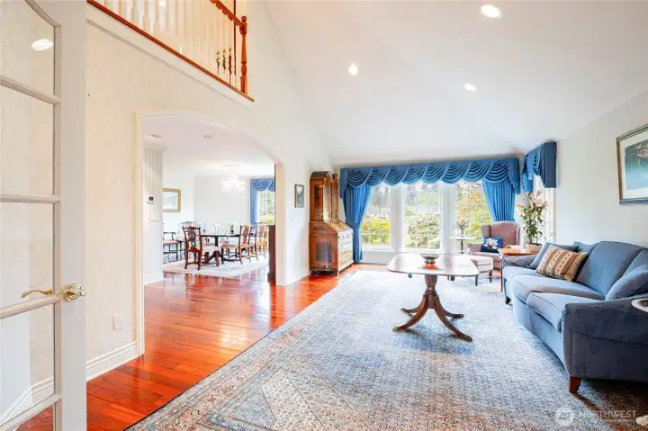 The grand Living room has approx. 20' high ceilings and the above landing is open to the space. The Views!