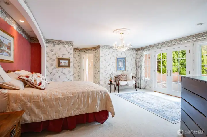 Spacious Primary room, with area for sitting, relaxing, and more French doors leading out to the patio!