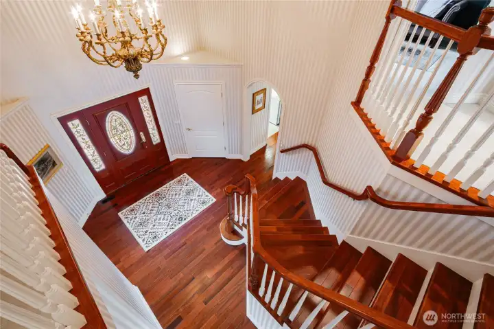 Notice the gorgeous custom chandelier? It easily drops down with a switch for easy cleaning and bulb replacement!