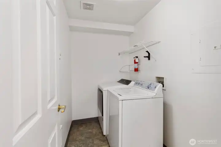 Laundry room located on entry level.