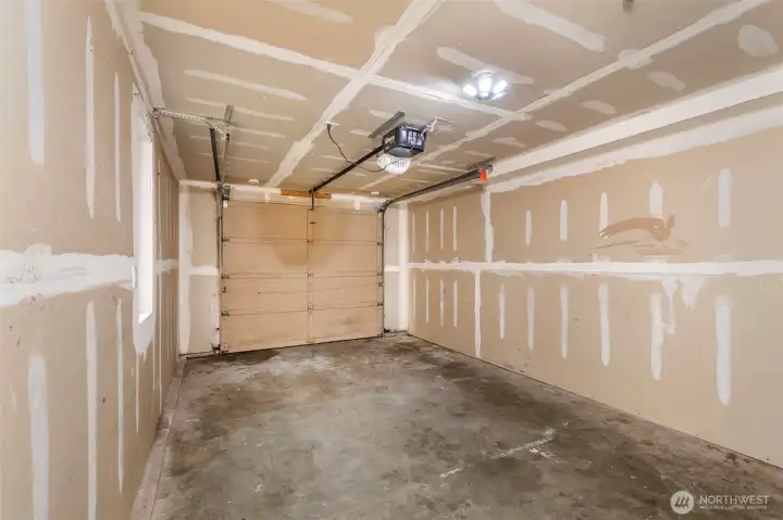Single car garage accessed from entry level.