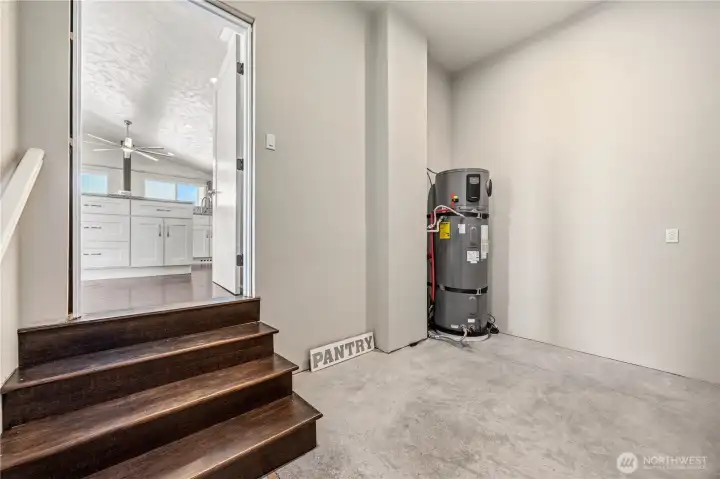 Spacious pantry and root cellar storage area designed for functionality, organization, and additional kitchen convenience.