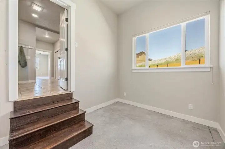 Flexible bonus room ideal for home office, nursery, dressing room, workout space, or hobby room.