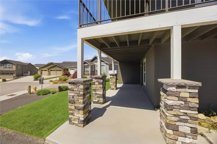 Private lower patio space with easy access to landscaped yard and outdoor entertaining areas.