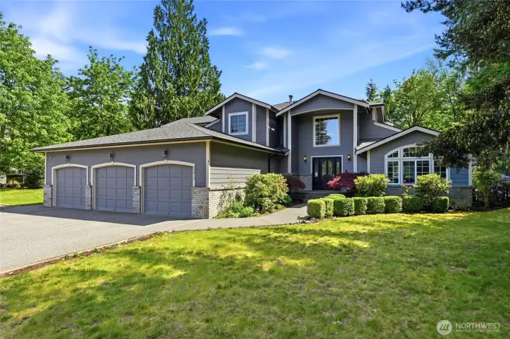 Private fully remodeled Enumclaw estate on 1.14 acres featuring custom home, mature landscaping, and rare shop space with peaceful surroundings.
