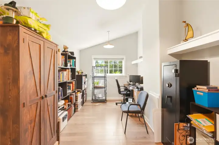 Dedicated main level primary home office or flex space, ideal for remote work or multigenerational living needs.