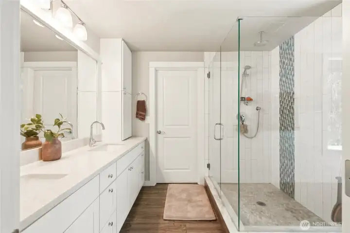 2nd Primary upstairs bathroom featuring dual vanity, large walk-in shower, and modern finishes for everyday comfort.