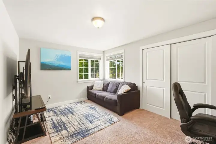 Versatile bonus room or bedroom / flex space ideal for home office, media room, or additional living area.