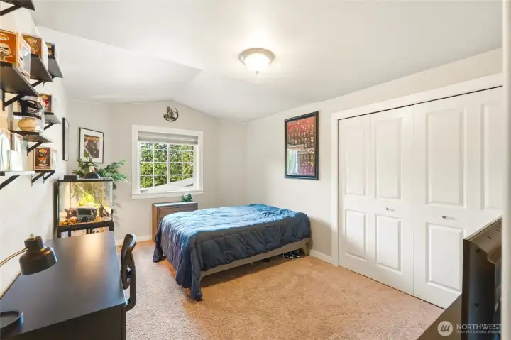5th bedroom with clean finishes, generous closet space, and natural light.