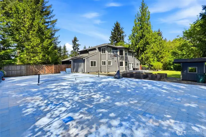Private sports court offering dedicated space for basketball, recreation, and outdoor activities—perfect for active lifestyle living on acreage in Enumclaw.