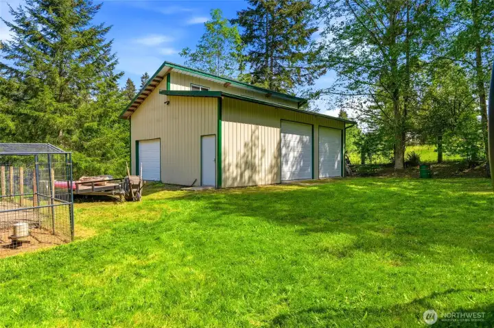 Detached shop and outbuilding ideal for storage, hobbies, workshop space, or RV garage use.