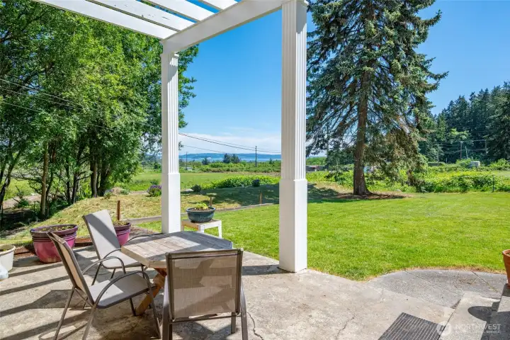 Looking out towards field and the view of Crescent Harbor beyond.