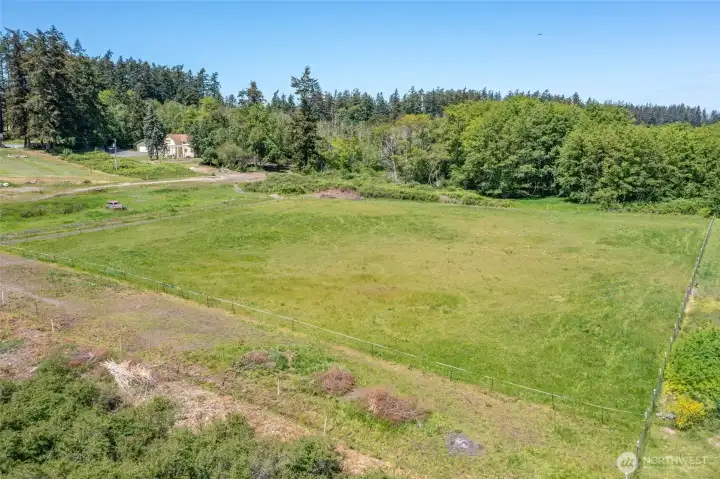Aerial view of home from field.