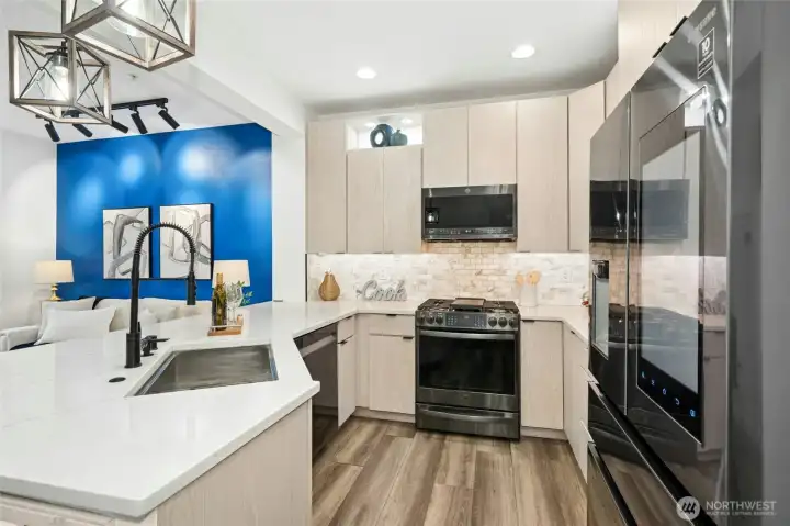 The kitchen comes equiped with a smart appliance package. Meaning, you can control your kitchen appliances from an app on your phone. The kitchen comes equiped with a smart appliance package. Meaning, you can control your kitchen appliances from an app on your phone.