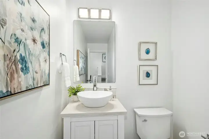 Main floor power bathroom with touchless faucet. Main floor power bathroom with touchless faucet.
