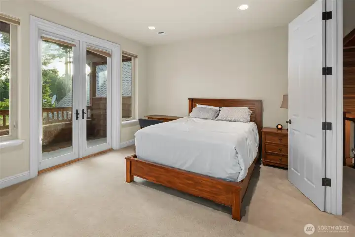 Upstairs ensuite bedroom with balcony