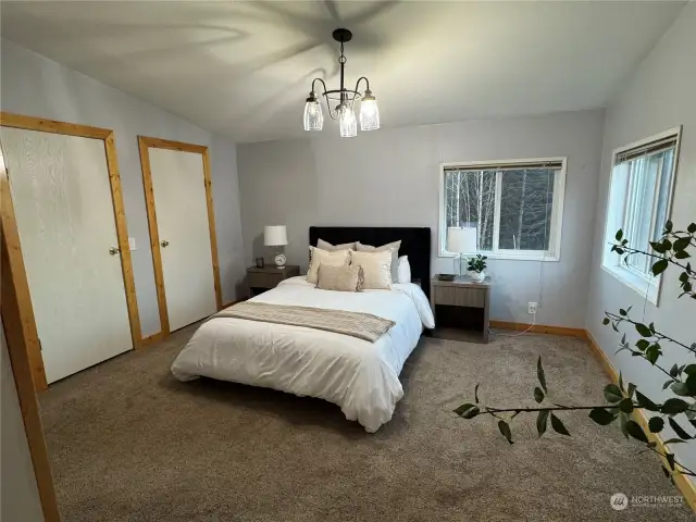 Primary bedroom large with corner windows