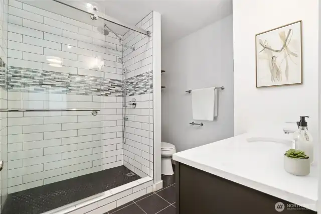 Beautiful custom shower in primary bathroom.