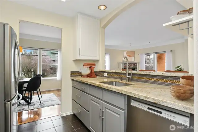 Beautiful custom tile in this updated kitchen.