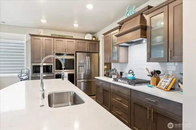 Also unique to Lennar builds, high-end appliance packages.  This home features the Frigidaire Gallery series with a built in double oven, microwave, 6-burner gas stove and refrigerator w/freezer drawer.