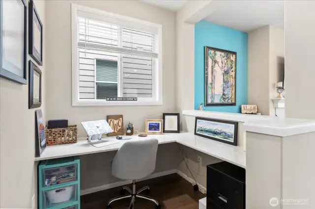 Unique to this model is this built-in work space, strategically designed with sight lines to the entire main level living space as well as that Mountain View.