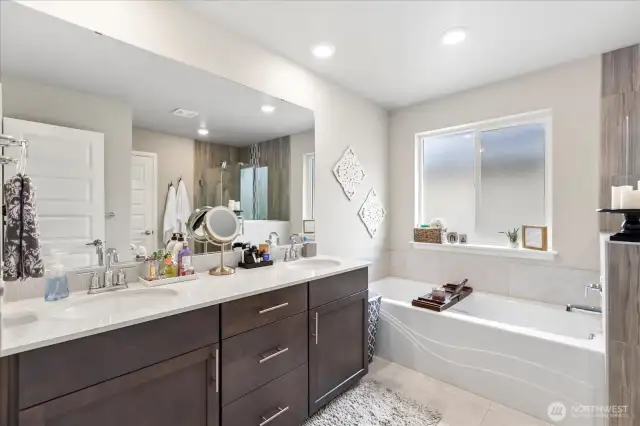 Double vanities and deep soaking tub are much appreciated features of the luxe bath.