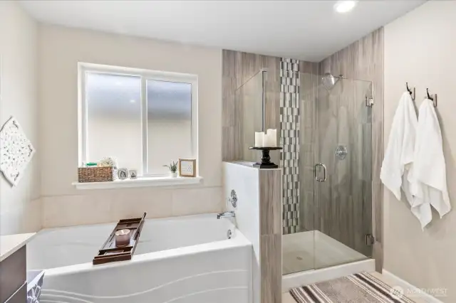 Gorgeous tiled shower with glass surround enclosure!