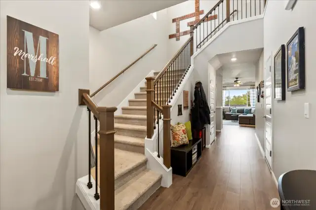 Classic Lennar builds have much more custom finishes, including the wrought iron/wood stairwell railing.