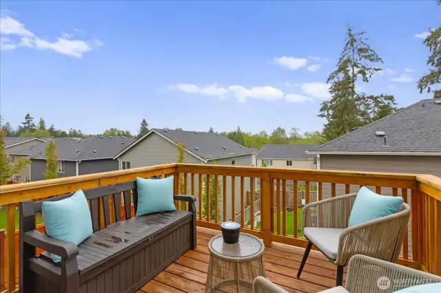 Lovely deck is located just off the dining space.  On a clear day there are forever views of the Cascade mountains.