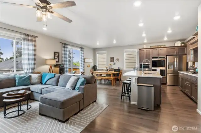 The gorgeous kitchen has sight lines of the entire main level living area.