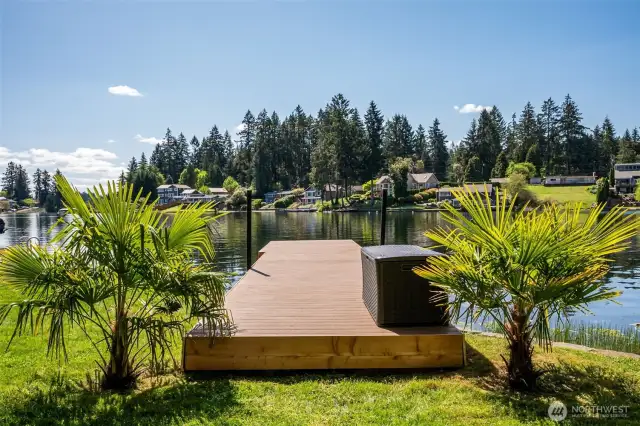 The Dock’s Ready, the Toys Are Included—Let’s Go! Here's your lakeside haven: the dock is waiting for your boat (or paddleboard, or anything else that floats), in your Pacific Northwest paradise. And don’t worry about the lake toys—they come with the house. That basket-weave storage chest? Just another clever way to keep it all organized and stylish.