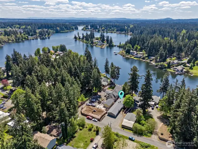 With towering pines in the distance and vibrant fall colors nearby, this back view offers the ultimate in tranquility. It’s the perfect spot to unwind and take in the ever-changing landscape of the seasons.
