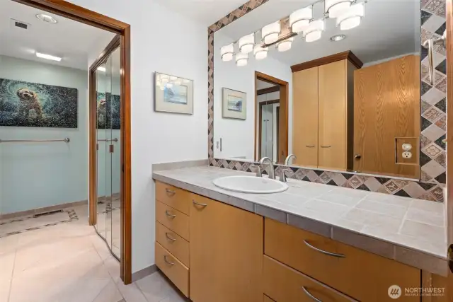 Bathroom off primary with double closets  & shower