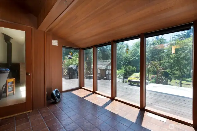 Sunroom can be accessed from family or living room
