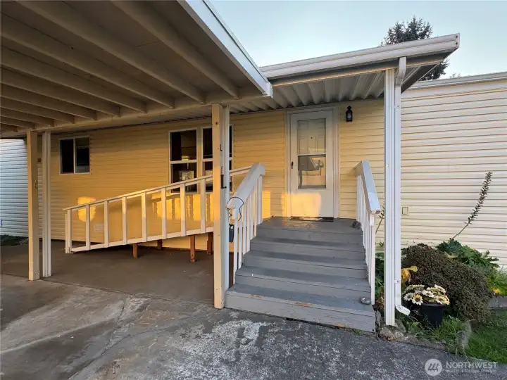 Wide easy stairs plus a ramp to the front door