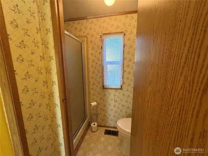 Walk in shower and commode in private room.