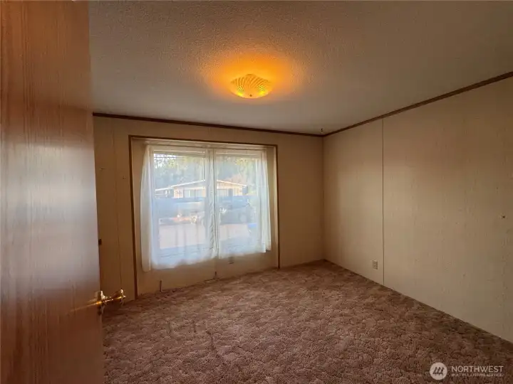 Second bedroom with built in vanity plus door into second bath.