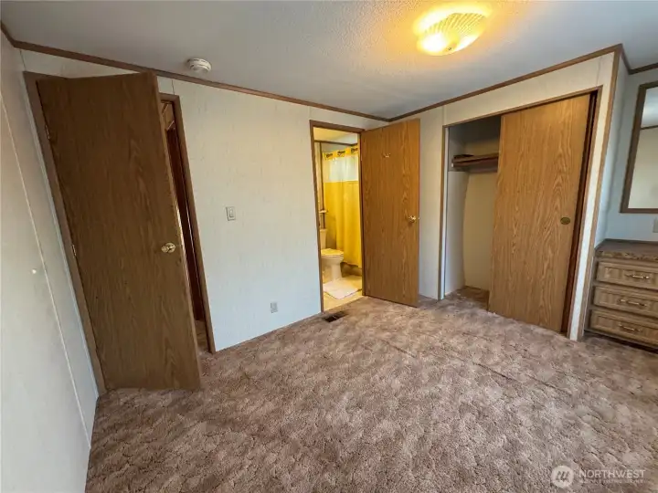 Bedroom connects to the bathroom.