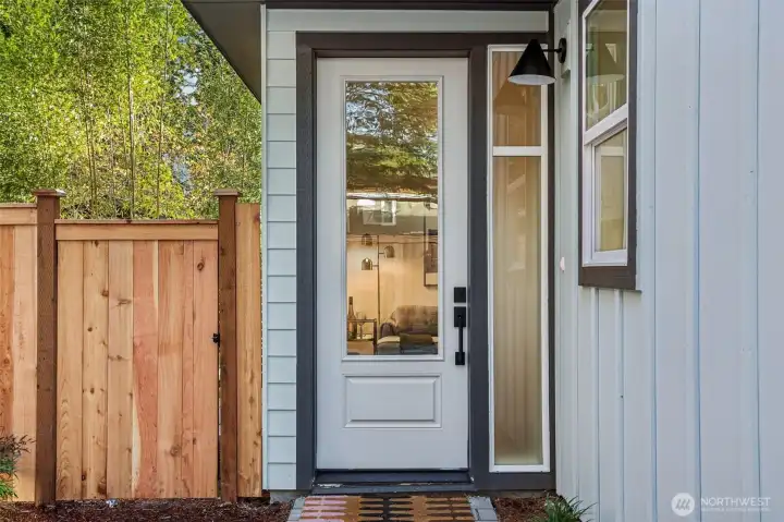 Paver Entry to Elegant Glass Front Door