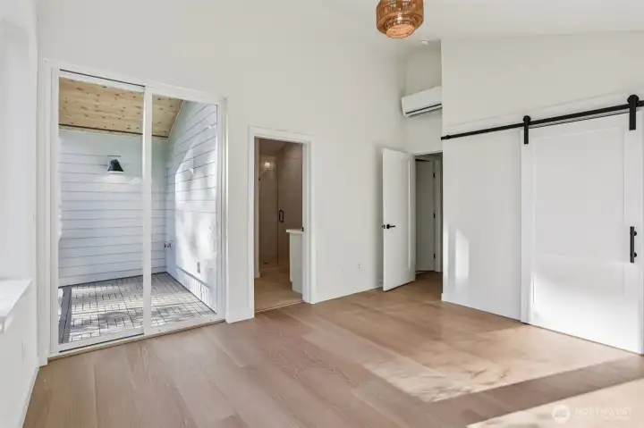 Primary Suite with view to the covered deck