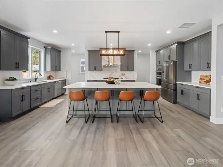 Tastefully designed with abundant cabinetry.